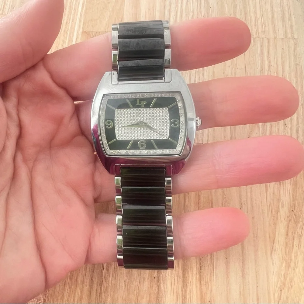 Lucien Piccard ladies rectangular black and silver tone dress watch NEW BATTERY